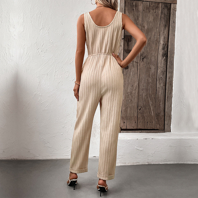 Tuta donna elegante senza maniche con cintura a pieghe