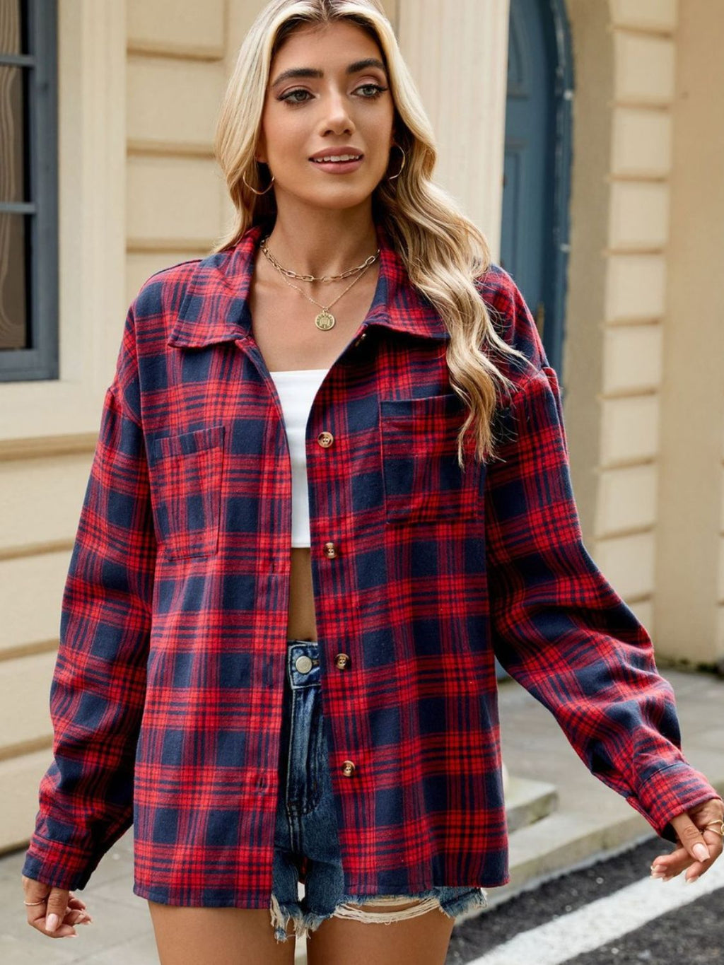 Camicia da donna a maniche lunghe con bottoni a scacchi
