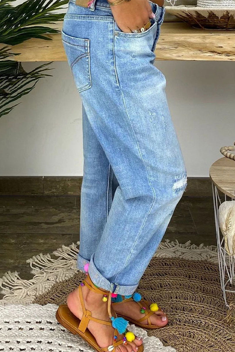 Jeans strappati a vita bassa da donna