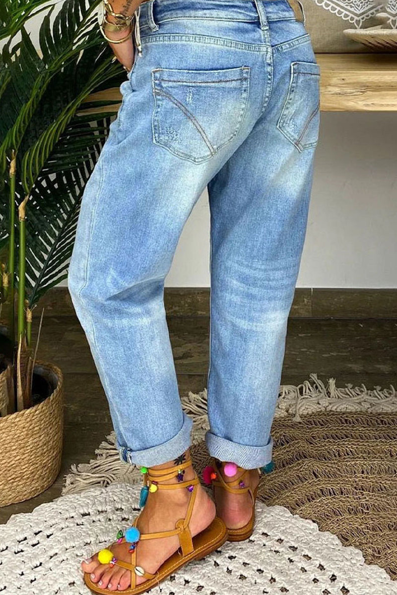 Jeans strappati a vita bassa da donna