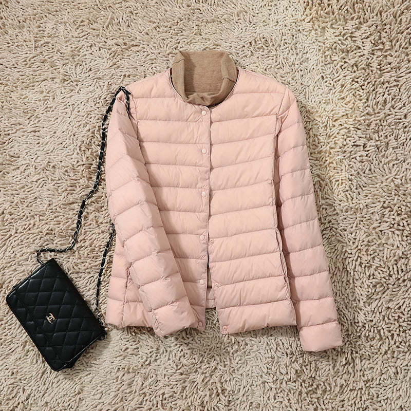 Let isolerende jakke til kvinder – Kort inderlag med rund halsudskæring