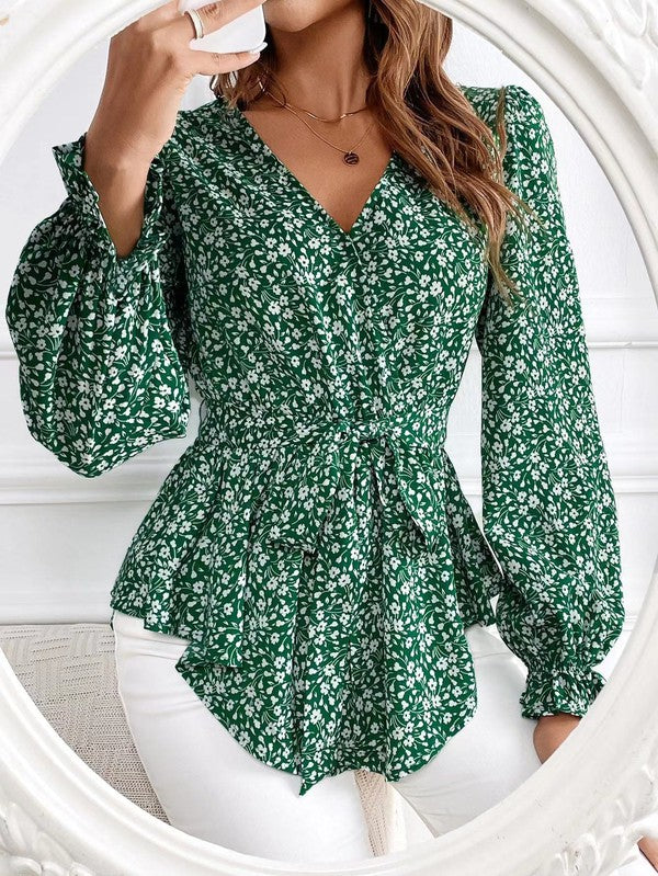 Elegante camicetta a maniche lunghe con stampa floreale e scollo a V