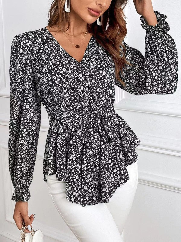 Elegante camicetta a maniche lunghe con stampa floreale e scollo a V