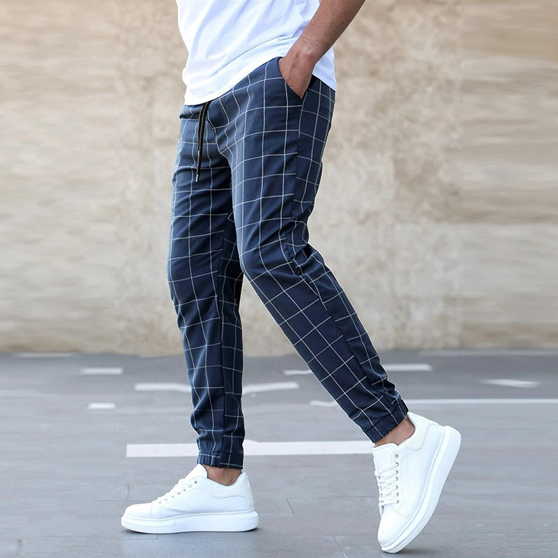 Pantaloni chinos a quadri slim di tendenza per uomo