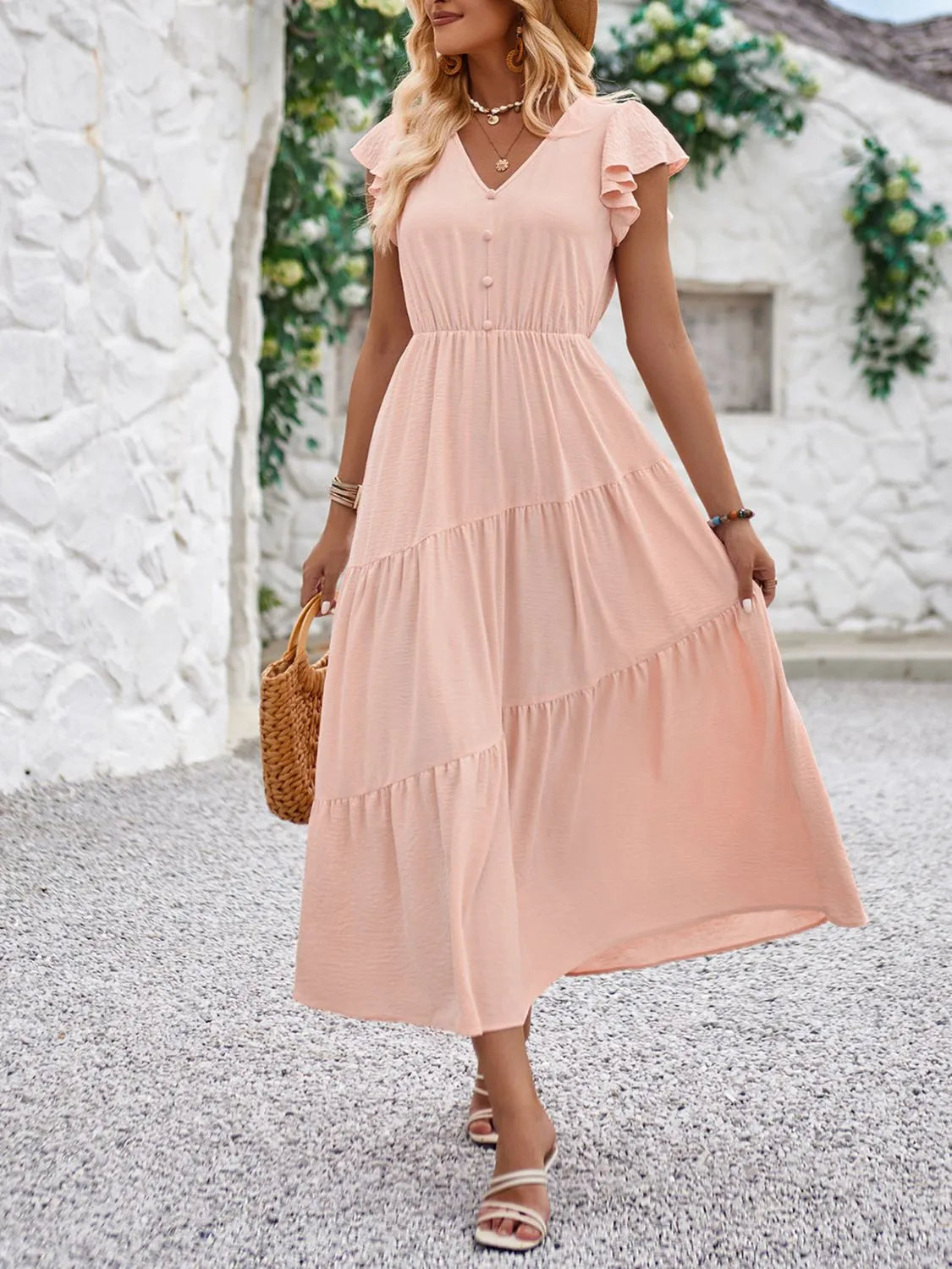 Elegante abito con scollo a V e maniche a balze