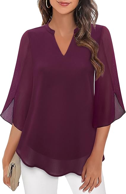 Blusa fluida con maniche a pipistrello – Eleganza e leggerezza