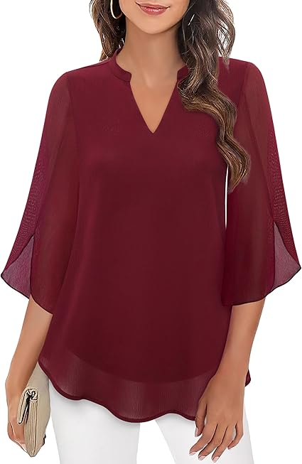 Blusa fluida con maniche a pipistrello – Eleganza e leggerezza