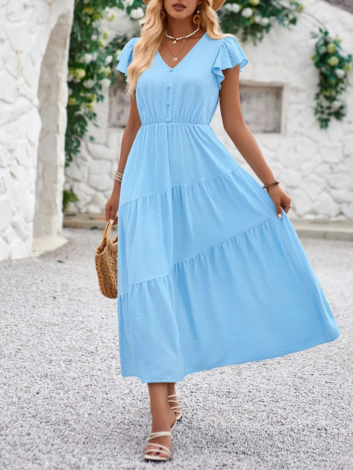 Elegante abito con scollo a V e maniche a balze