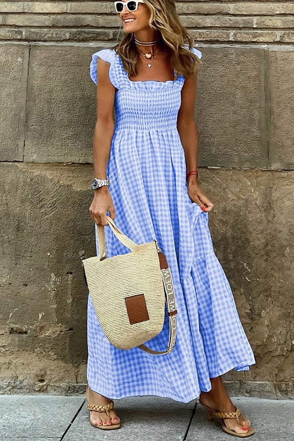 Maxi abito classico a scacchi da donna