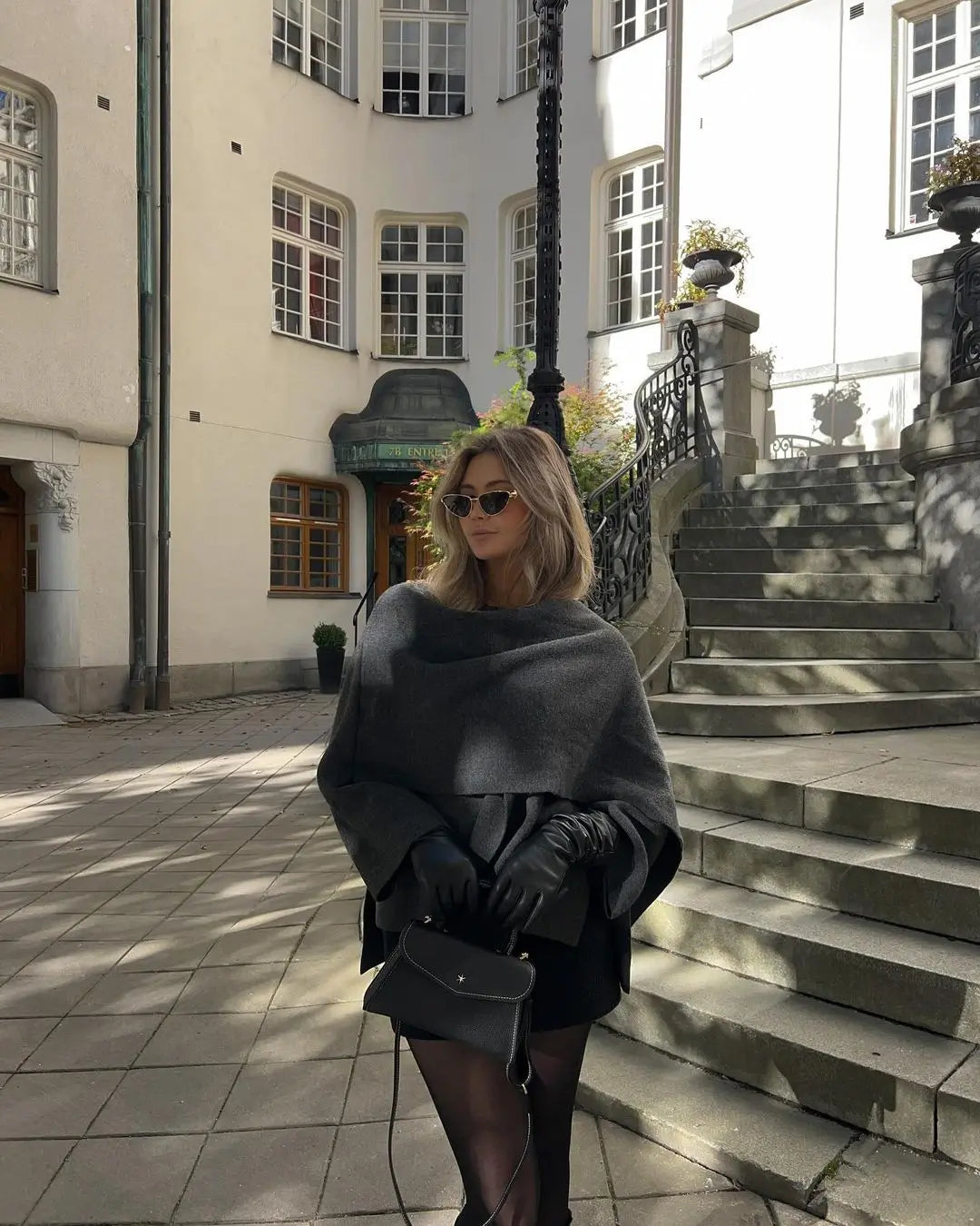 Elegante cappotto da donna con collo a scialle