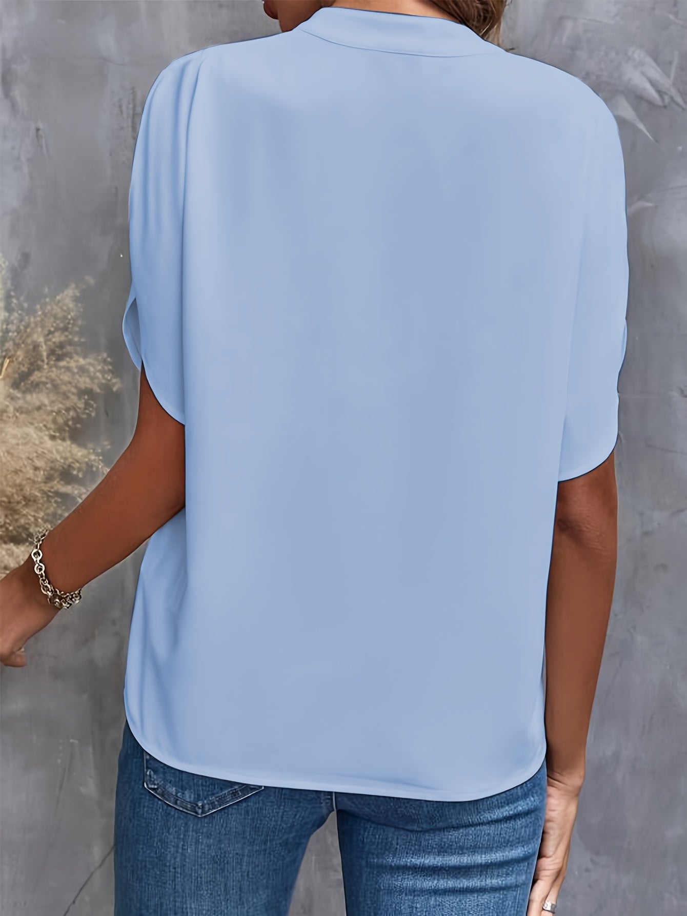 Camicetta elegante da donna a maniche corte