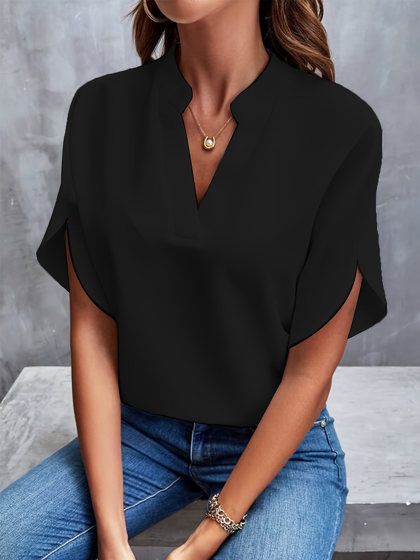 Camicetta elegante da donna a maniche corte