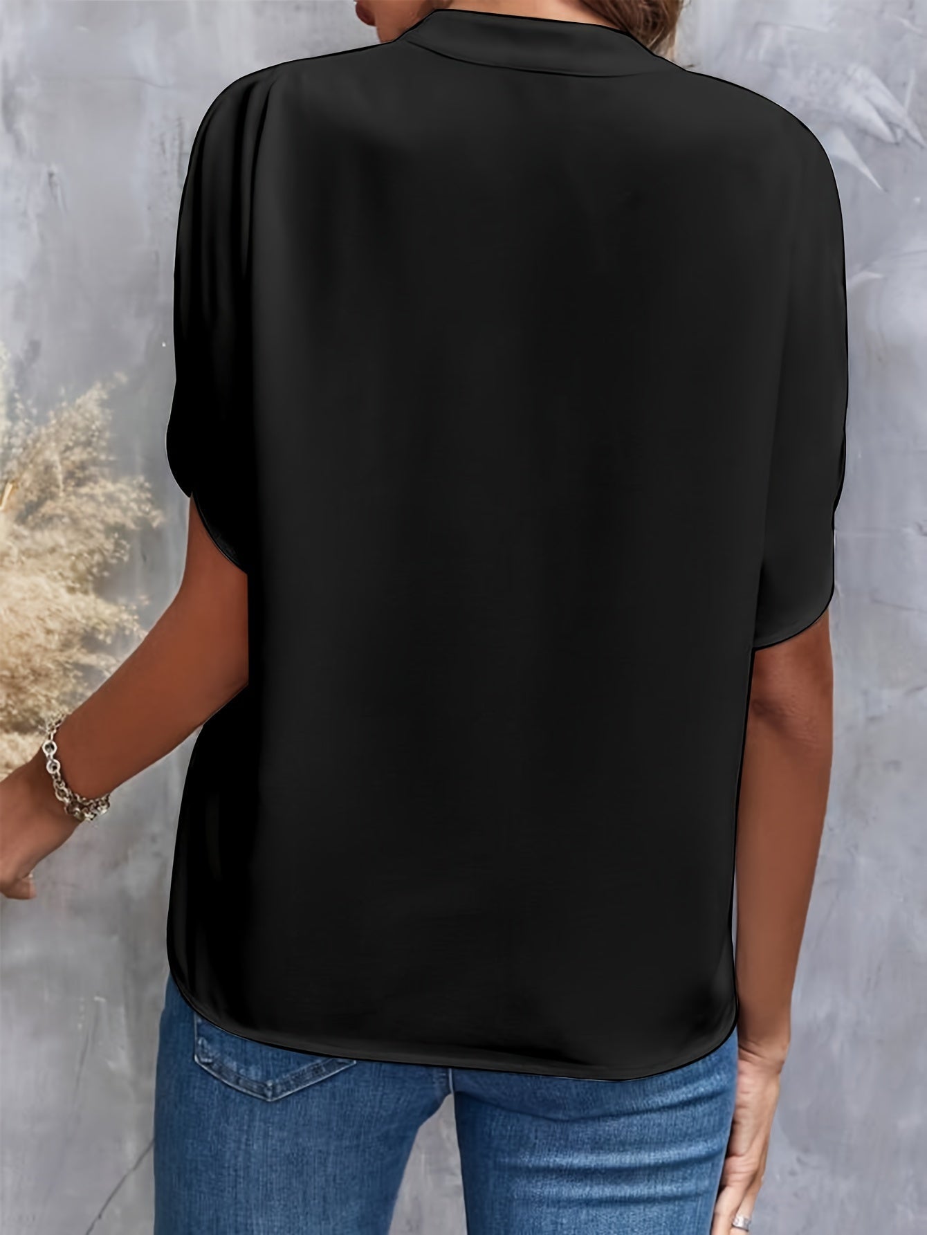 Camicetta elegante da donna a maniche corte