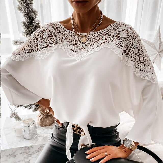 Blusa elegante da donna con pizzo – maniche lunghe e stile chic