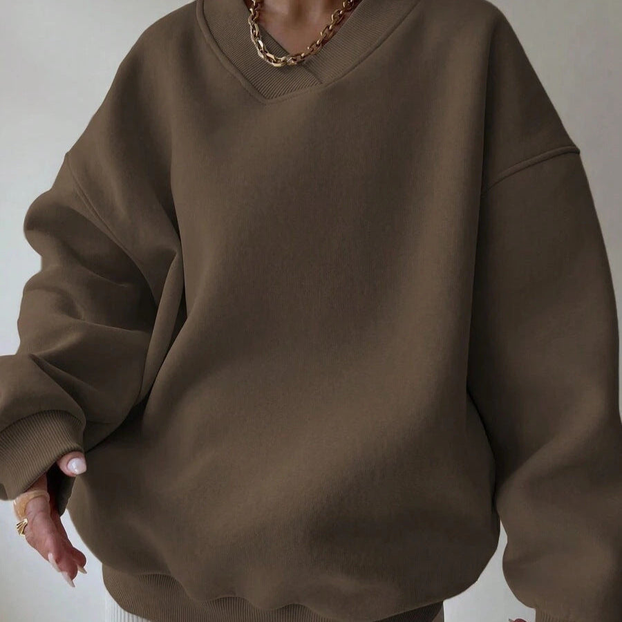Maglione da donna a tinta unita con scollo tondo e maniche lunghe