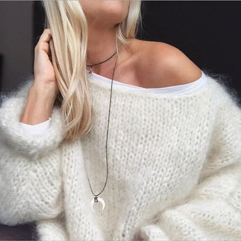 Maglione lavorato a maglia elegante e alla moda per donna