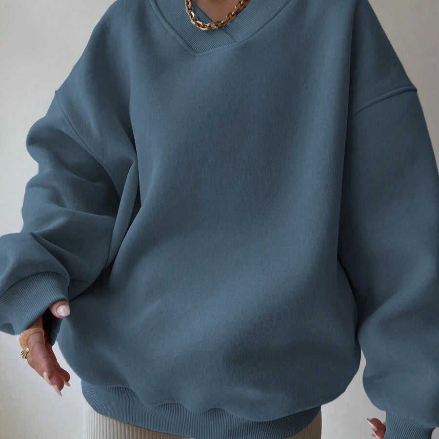 Maglione da donna a tinta unita con scollo tondo e maniche lunghe