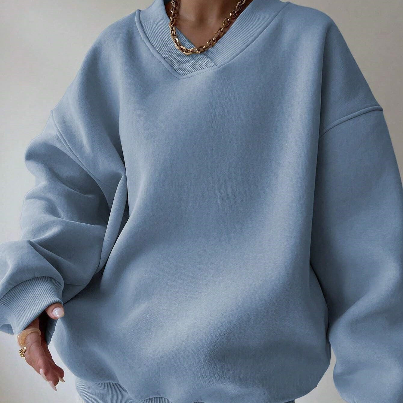 Maglione da donna a tinta unita con scollo tondo e maniche lunghe