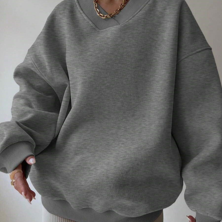Maglione da donna a tinta unita con scollo tondo e maniche lunghe