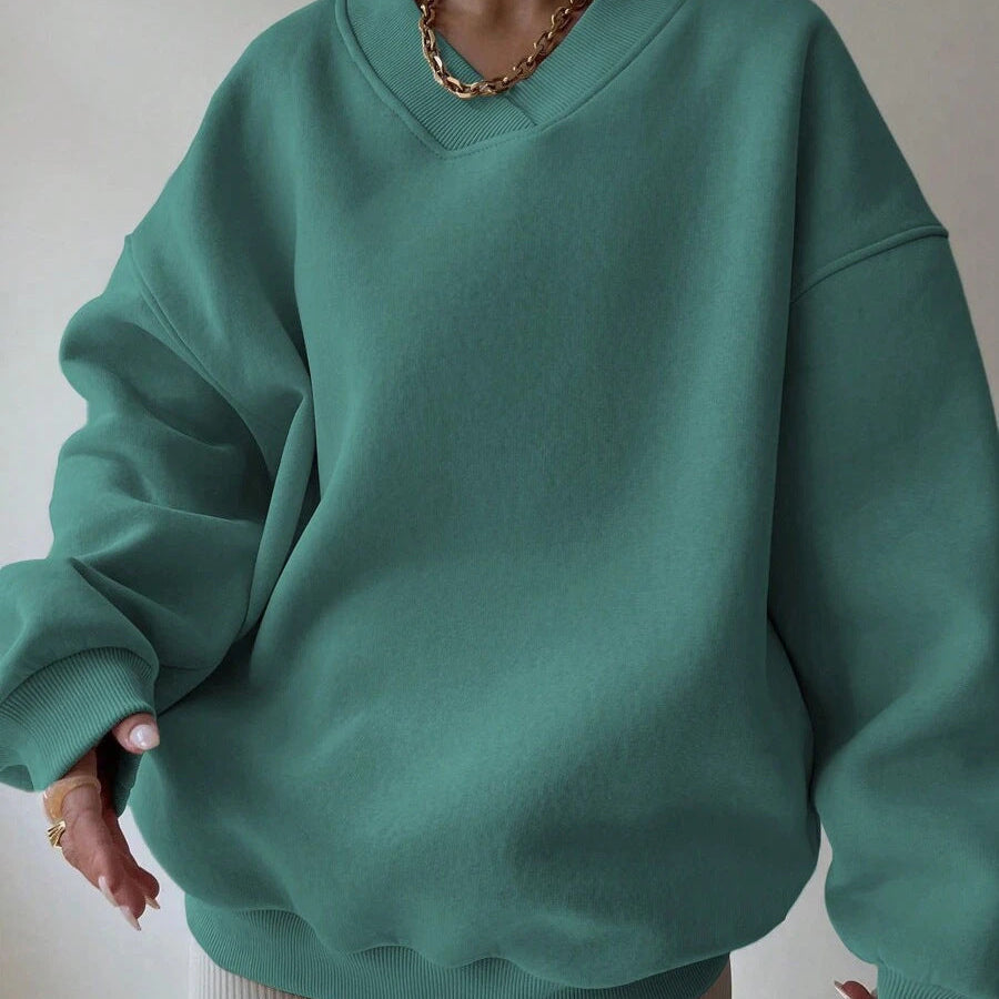 Maglione da donna a tinta unita con scollo tondo e maniche lunghe