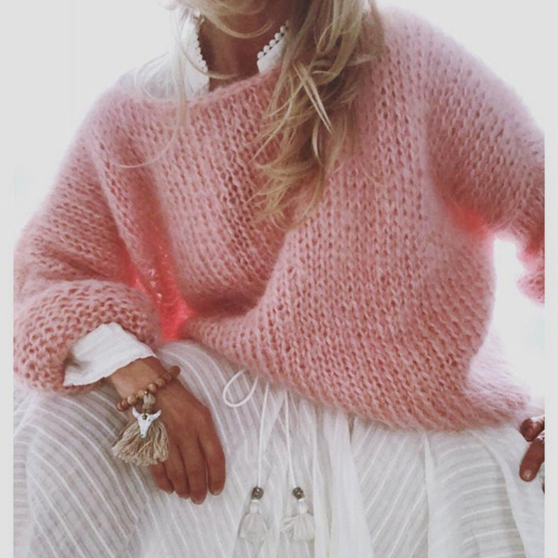 Maglione lavorato a maglia elegante e alla moda per donna