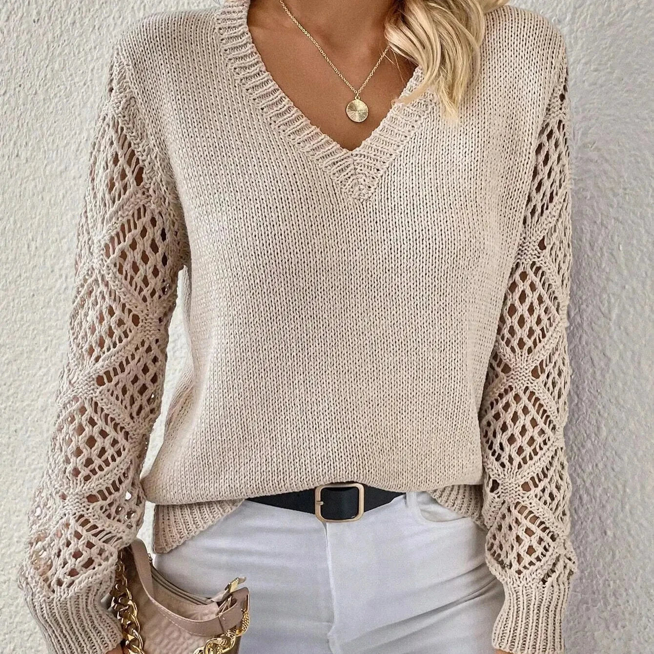 Maglione elegante con scollo a V da donna