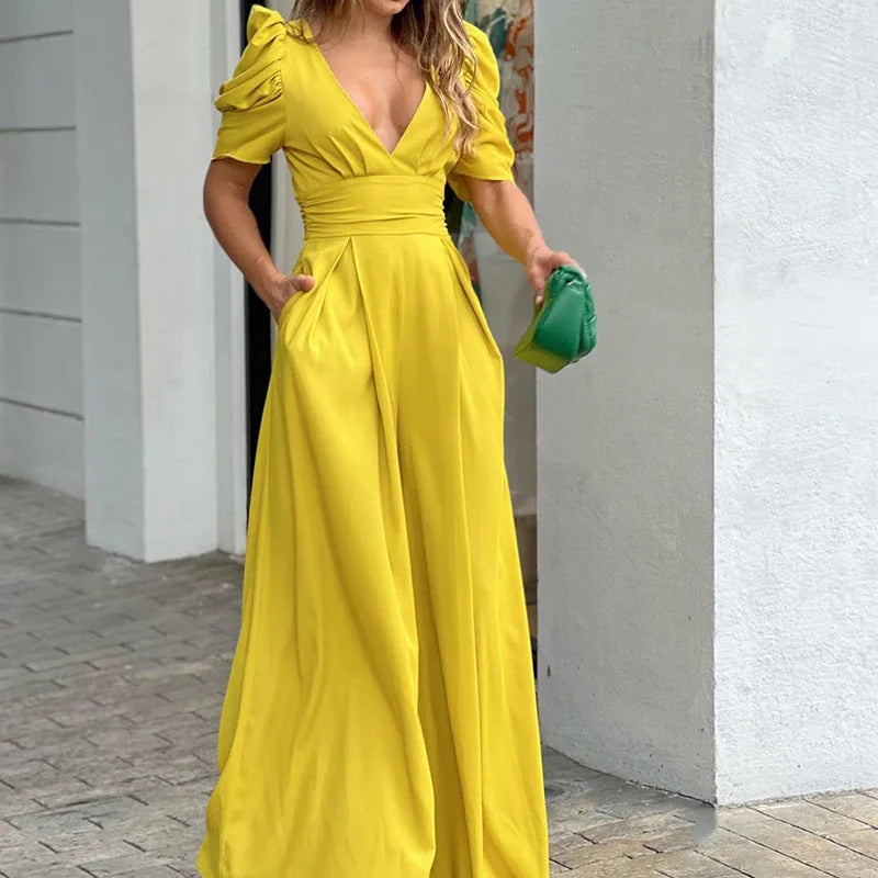 Donna Tuta Elegante Scollo V Maniche a Palloncino – Audace, Femminile, Raffinata