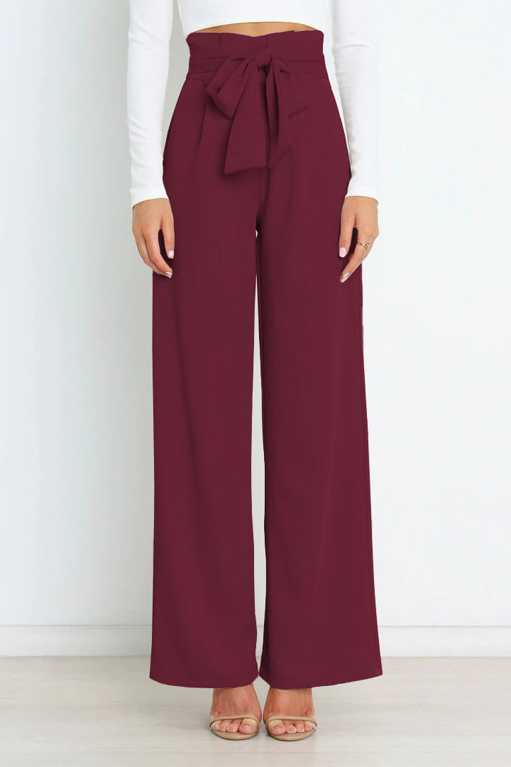 Pantaloni larghi a vita alta da donna con cintura a nastro