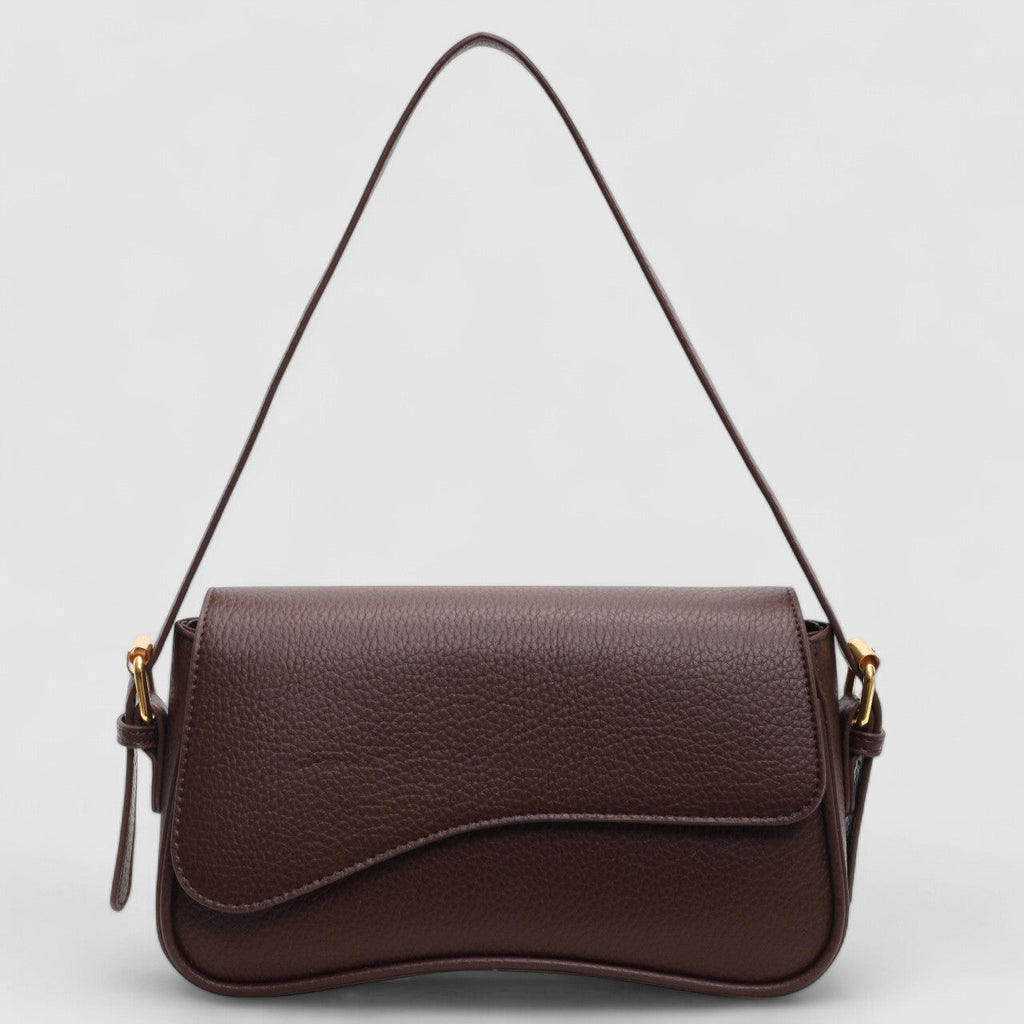 Elegante borsa a mano ondulata in pregiata pelle vegana