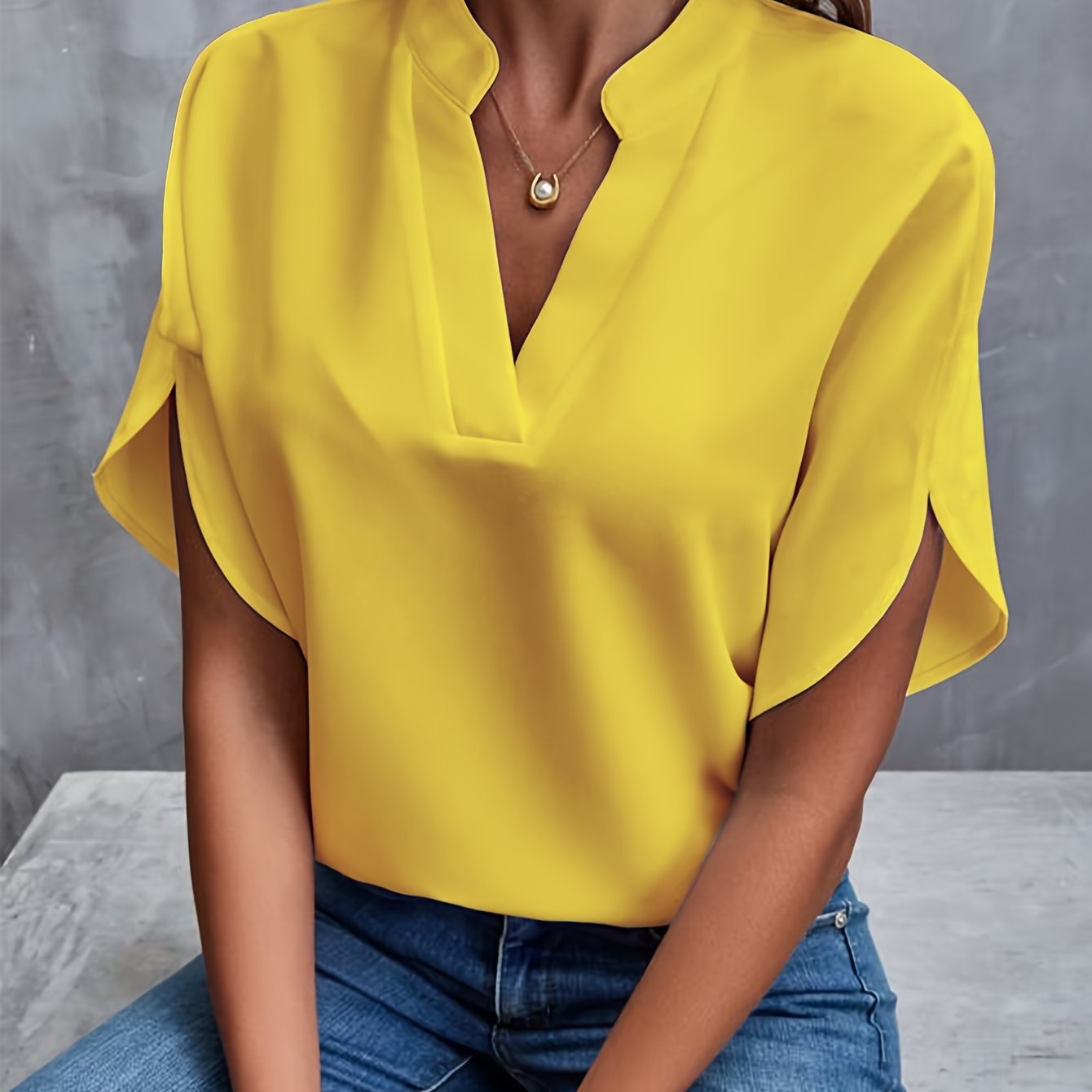 Camicetta elegante da donna a maniche corte