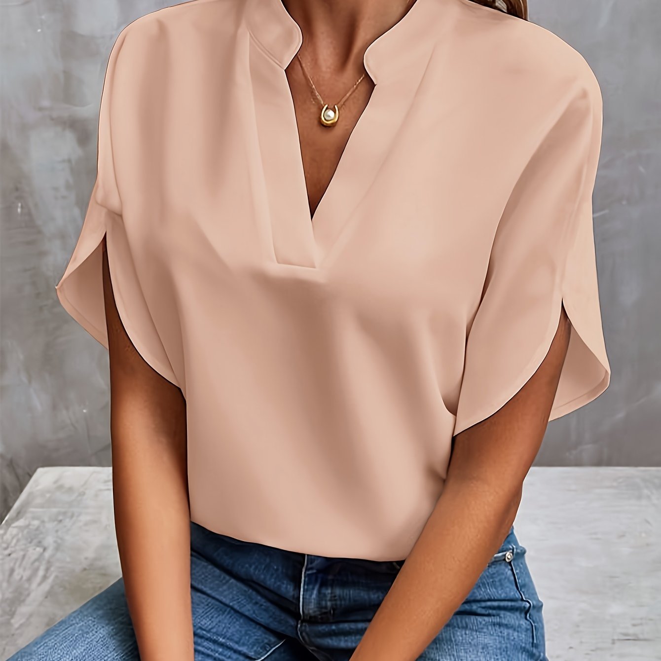 Camicetta elegante da donna a maniche corte