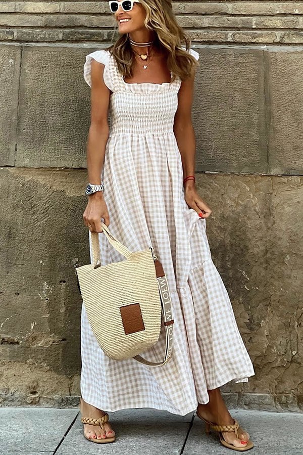 Maxi abito classico a scacchi da donna