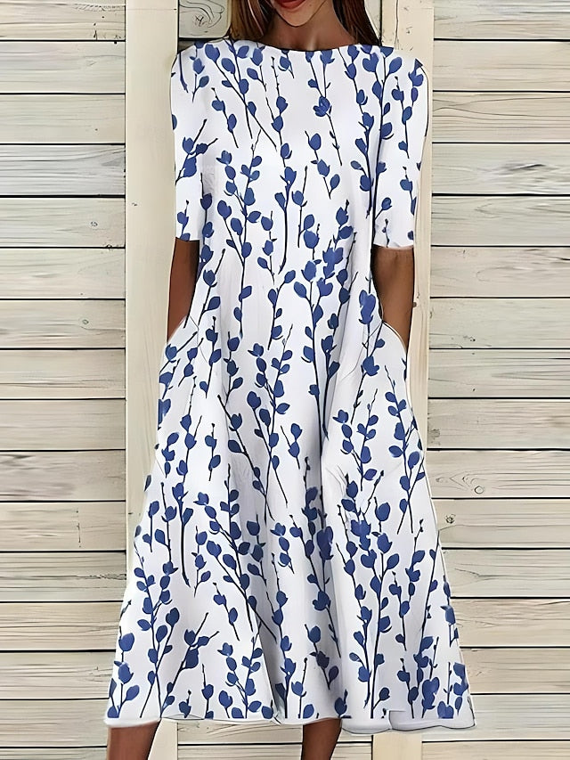 Abito estivo midi con scollo tondo e stampa floreale costiera