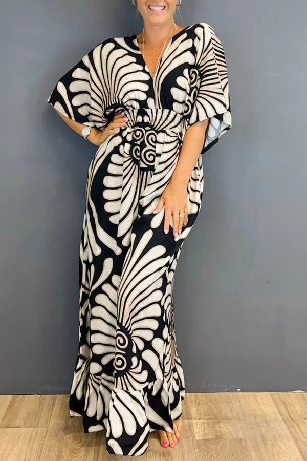 Tuta da donna con stampa floreale vintage e maniche arricciate