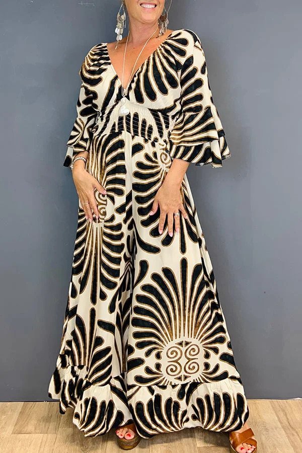 Tuta da donna con stampa floreale vintage e maniche arricciate