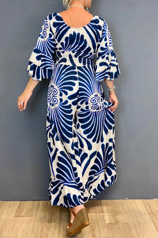 Tuta da donna con stampa floreale vintage e maniche arricciate