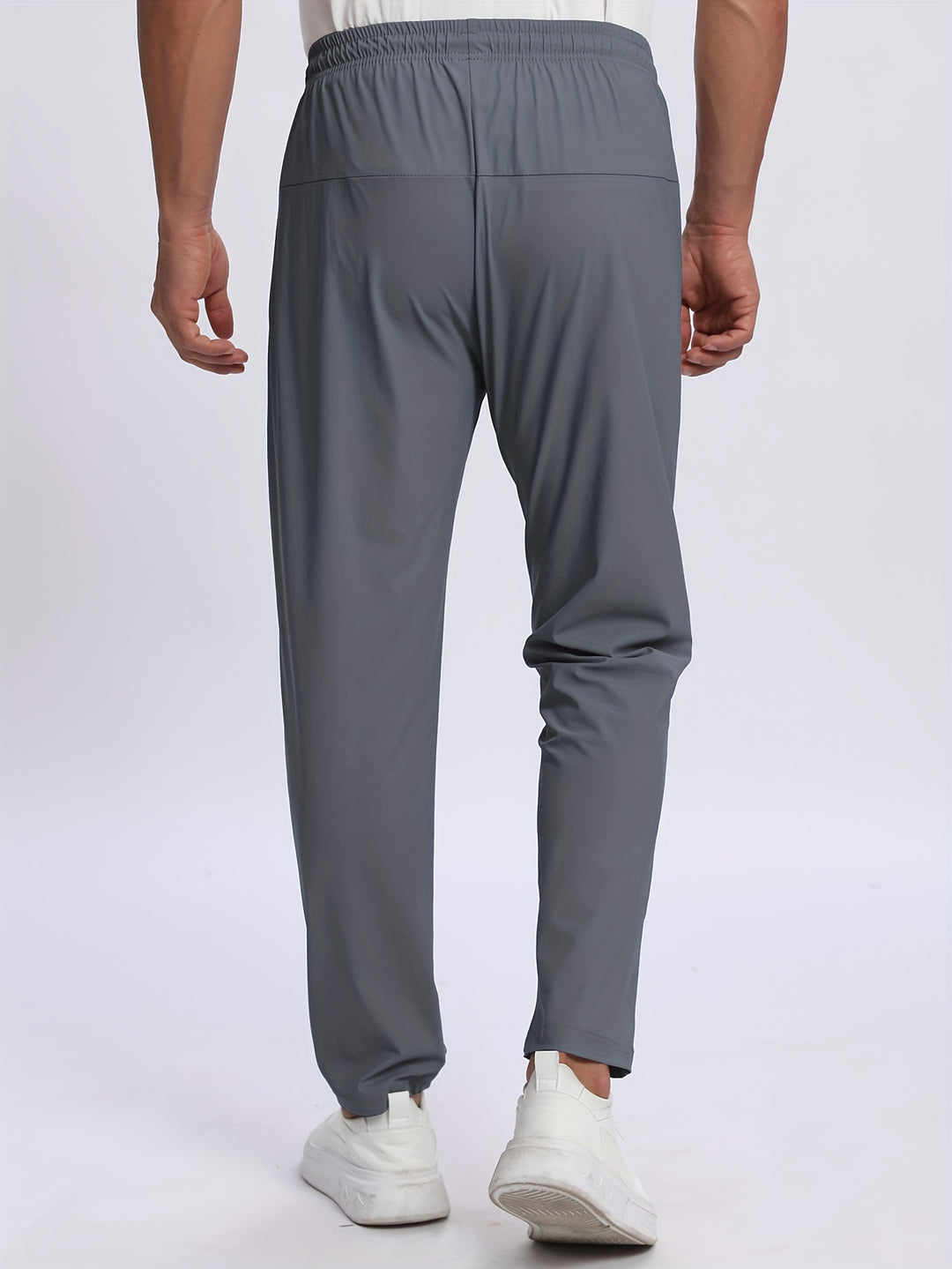 Pantaloni uomo elasticizzati – pantalon sportivo con tasche zip