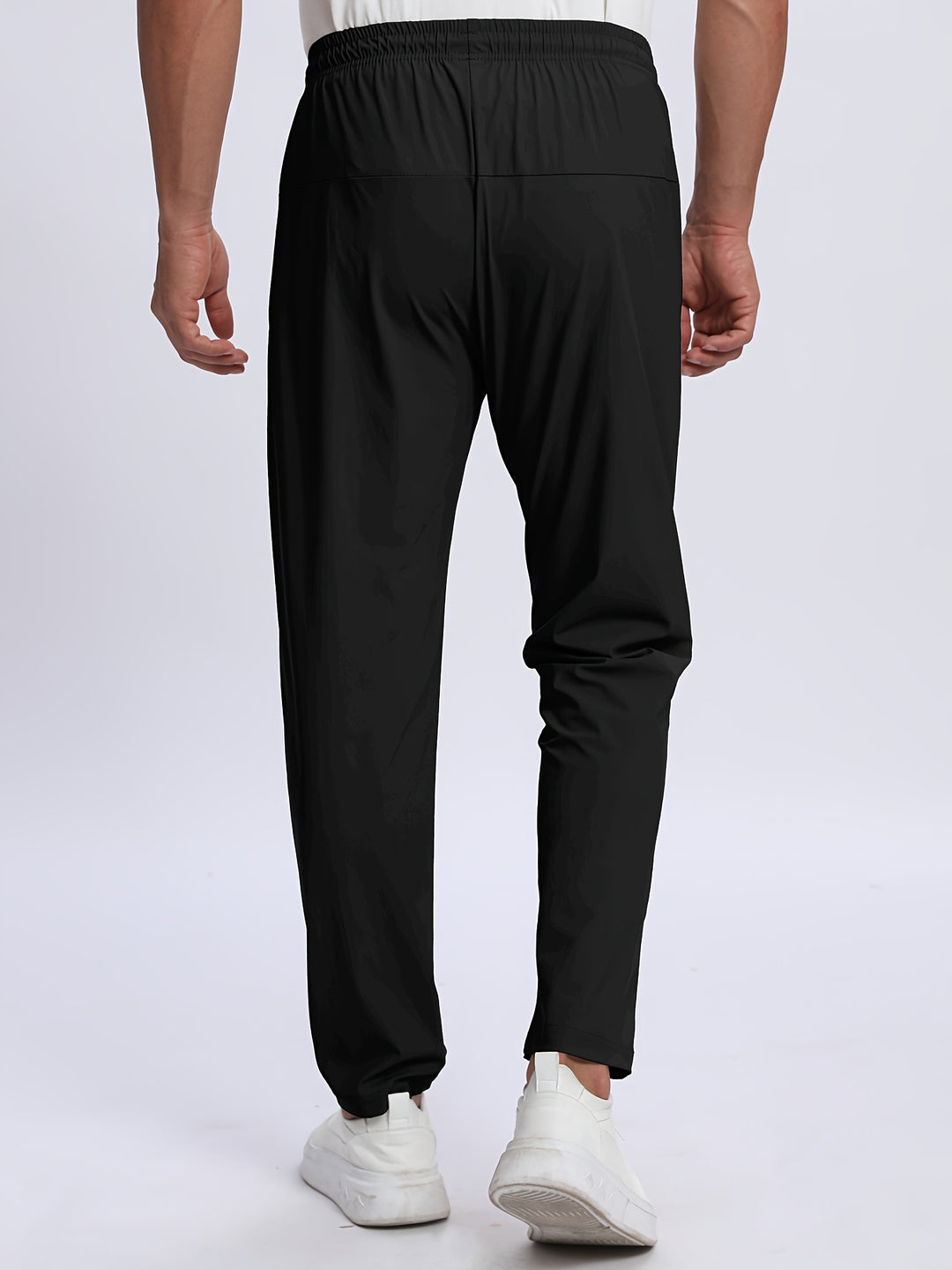 Pantaloni uomo elasticizzati – pantalon sportivo con tasche zip