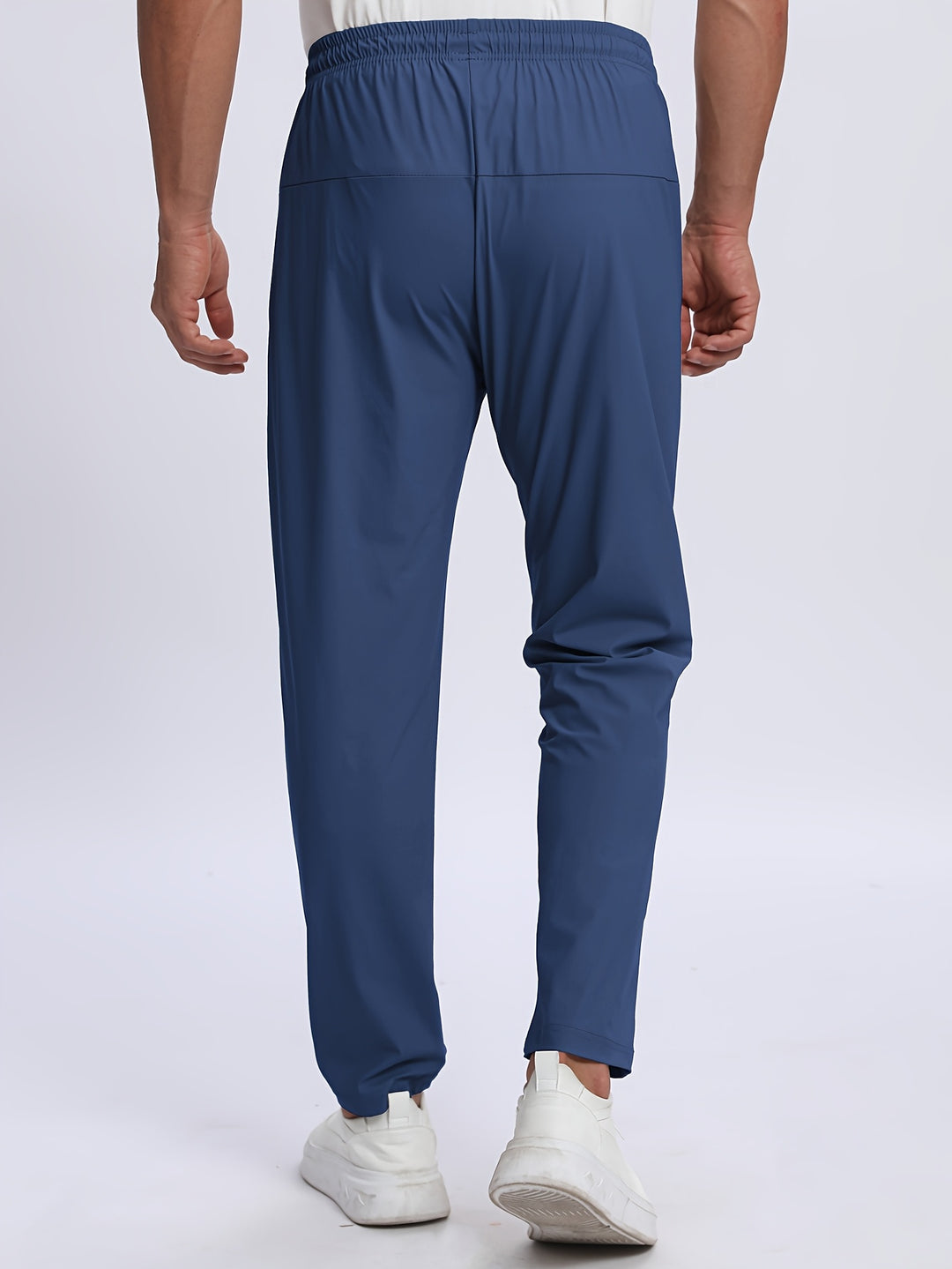 Pantaloni uomo elasticizzati – pantalon sportivo con tasche zip