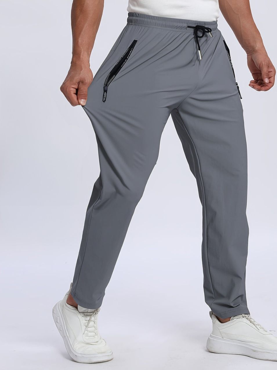 Pantaloni uomo elasticizzati – pantalon sportivo con tasche zip