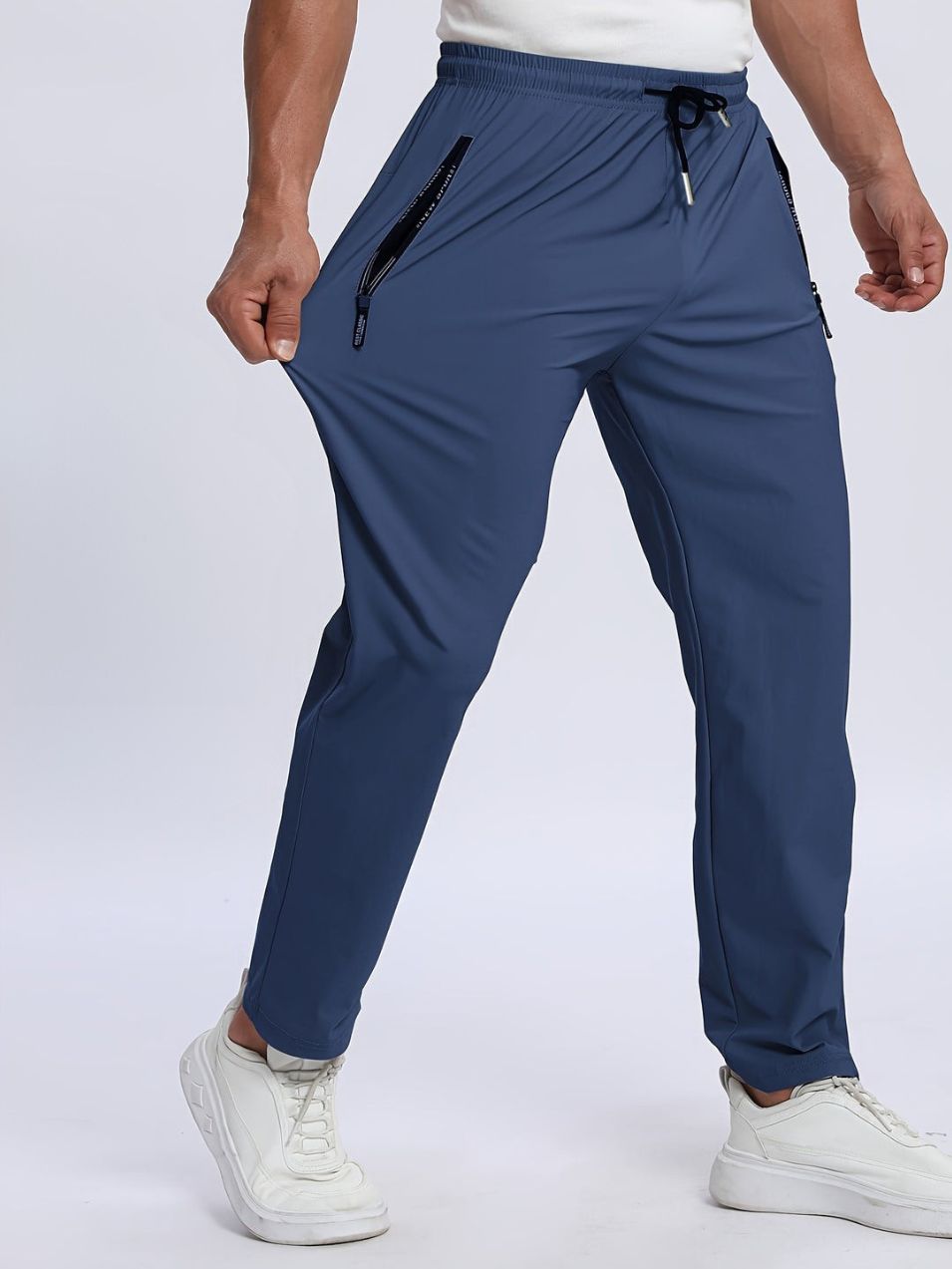 Pantaloni uomo elasticizzati – pantalon sportivo con tasche zip