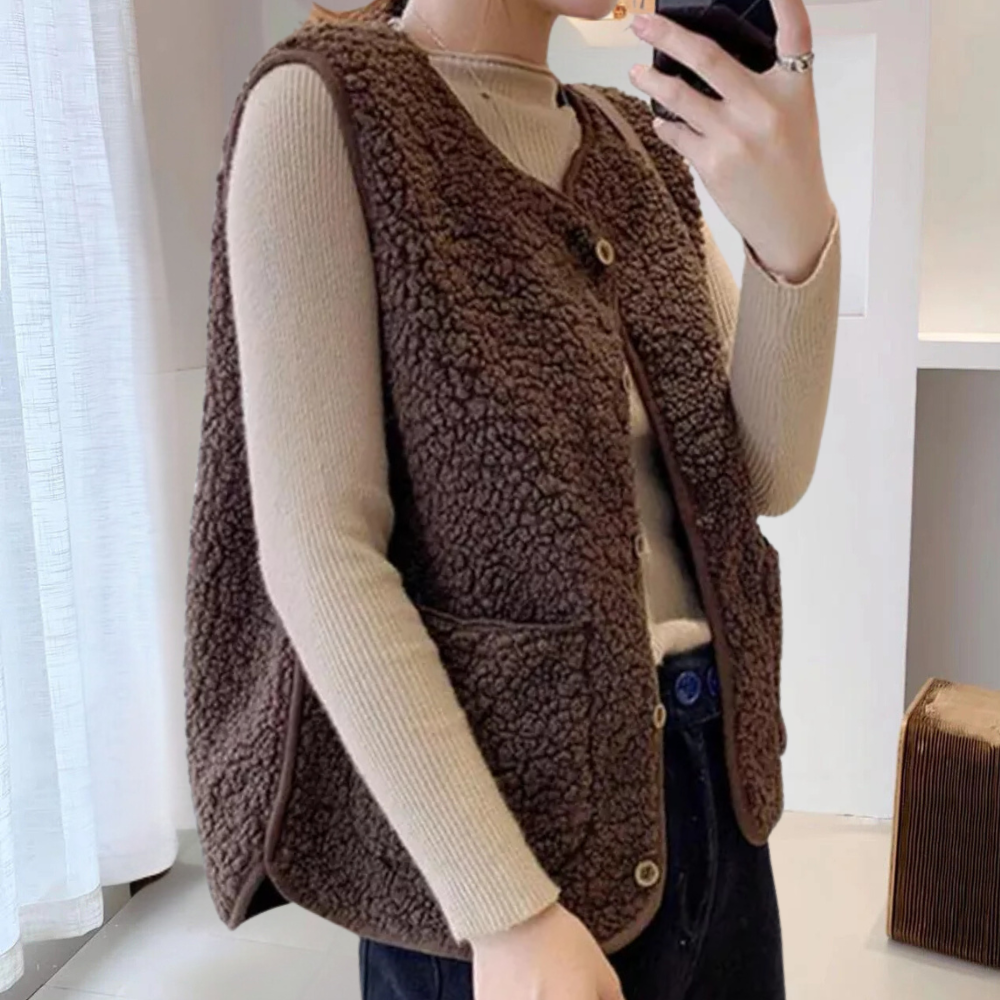 Gilet in sherpa - trendy gilet con bottoni da donna