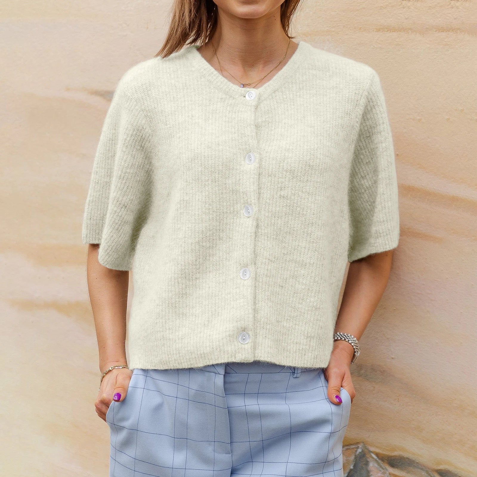 Cardigan elegante a maniche corte da donna