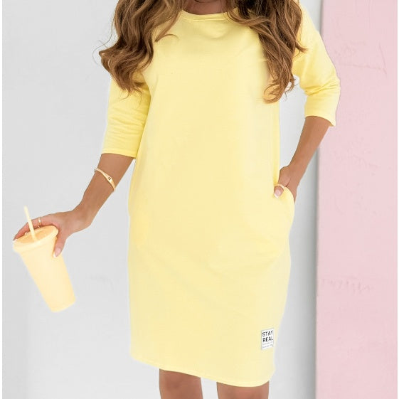 Abito da donna con scollo tondo e maniche a 3/4 con tasche
