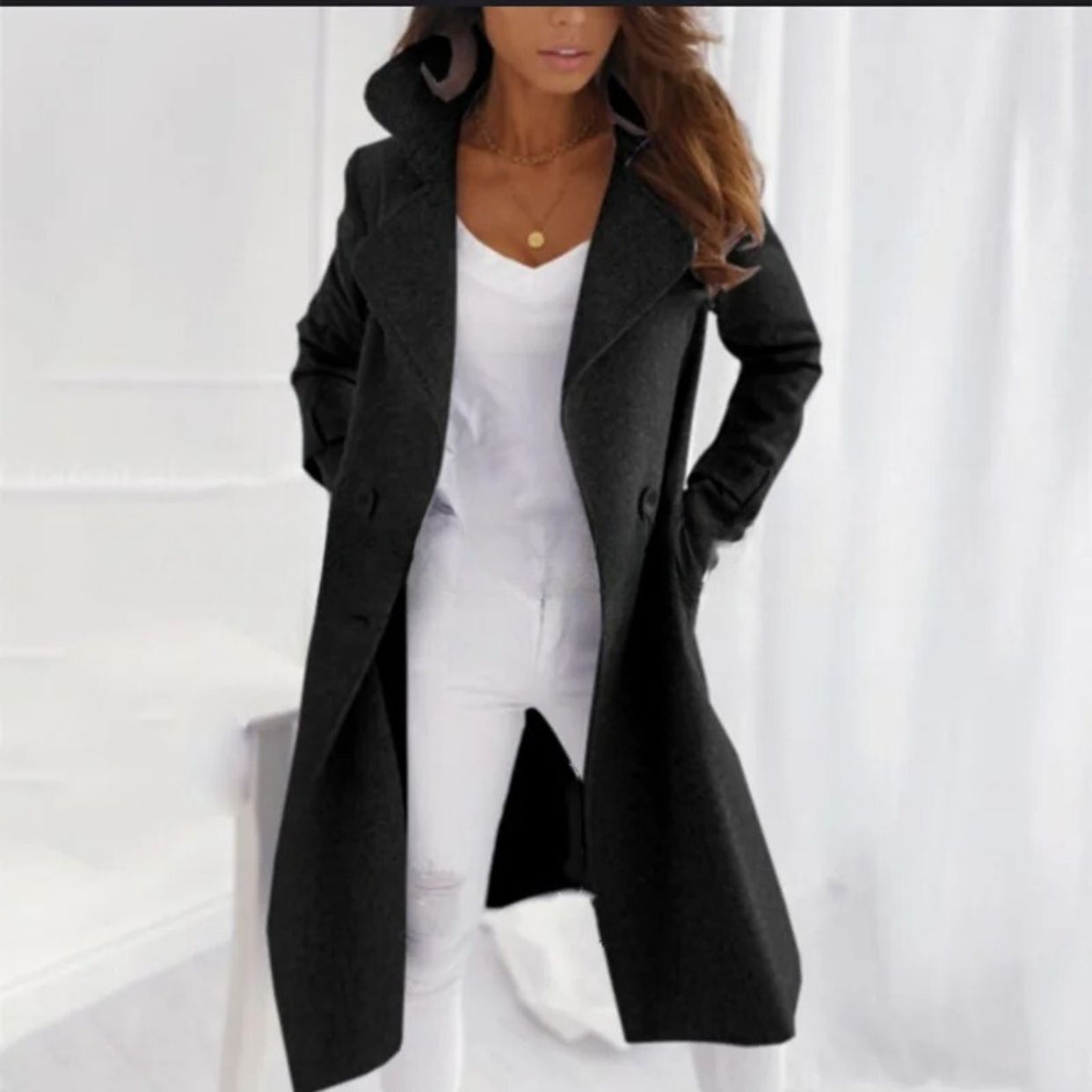 Elegante cappotto lungo da donna con colletto rovesciato