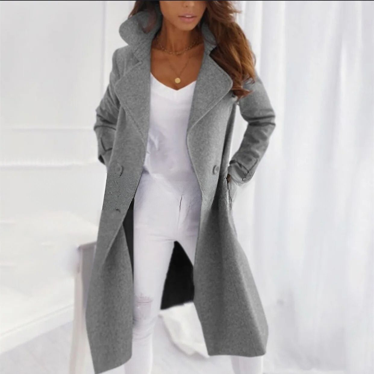 Elegante cappotto lungo da donna con colletto rovesciato