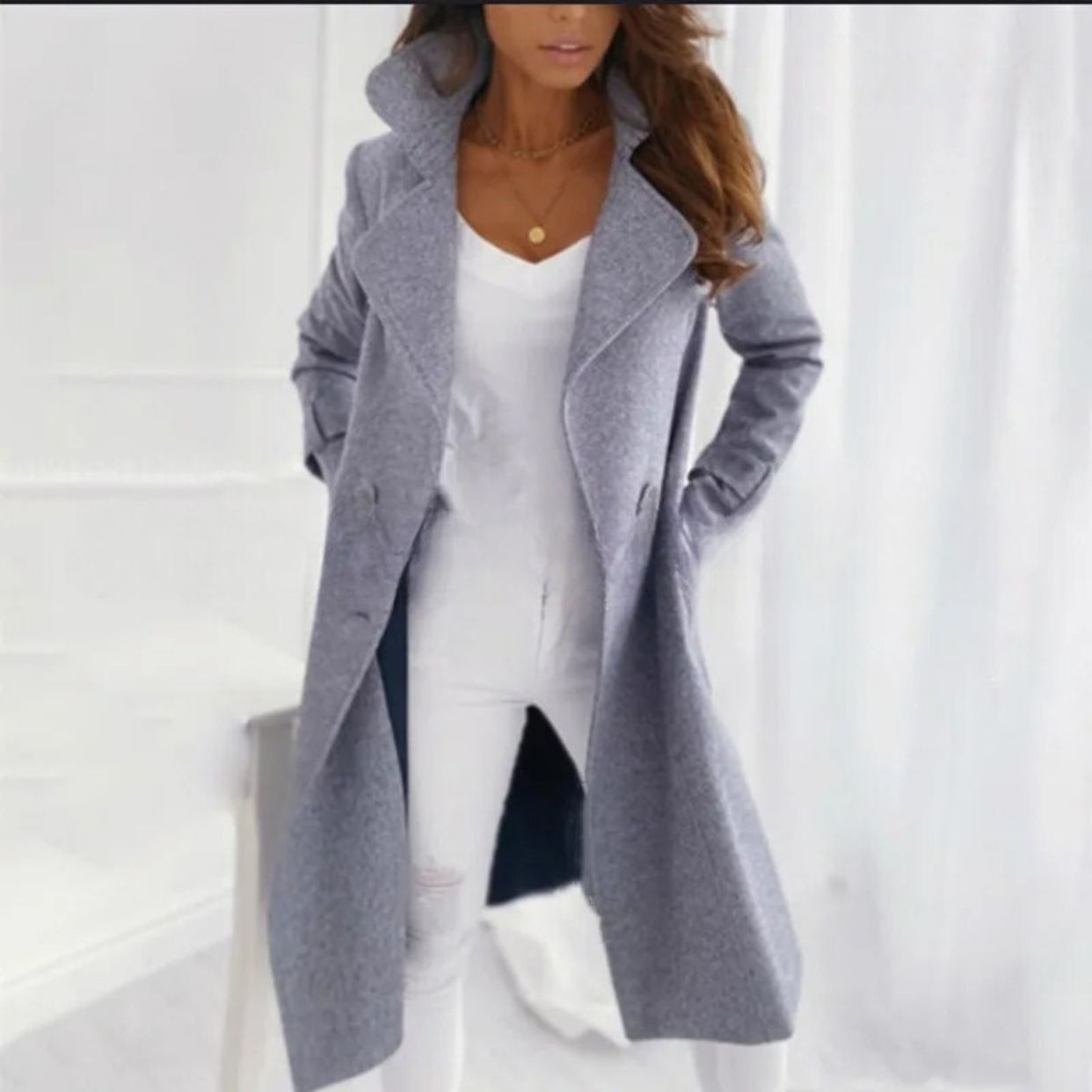 Elegante cappotto lungo da donna con colletto rovesciato